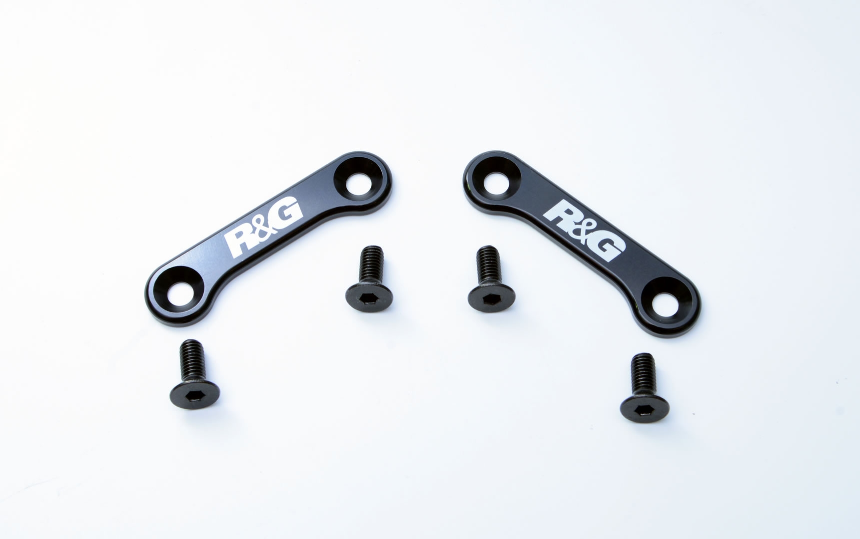 Caches orifices de repose-pieds passager R&G Racing noirs Triumph Tige